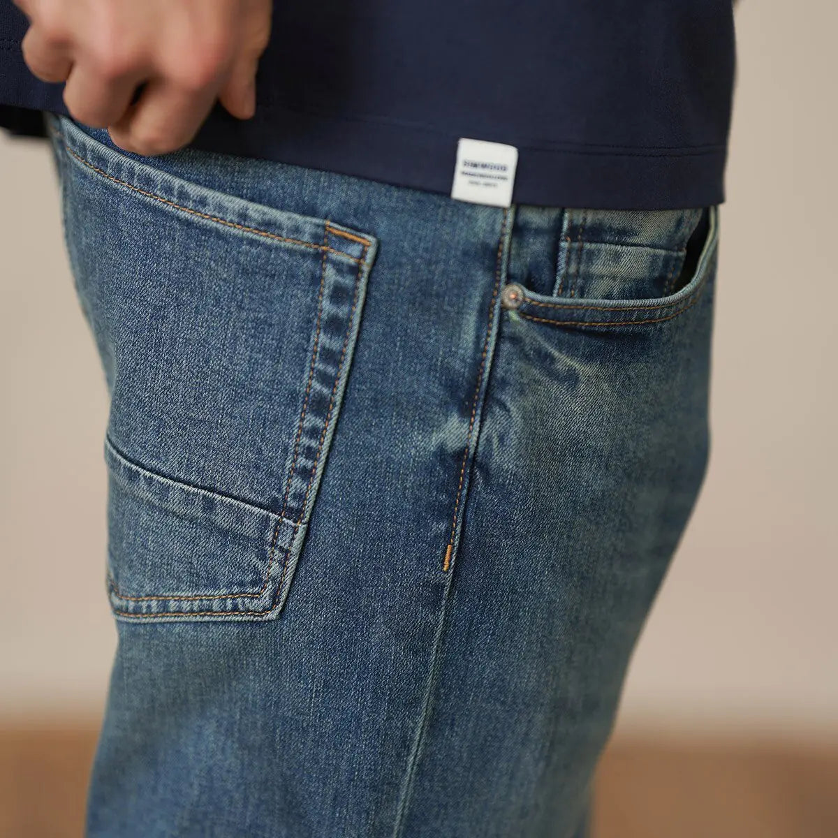 Primavera nuevos pantalones vaqueros ceñidos para hombres