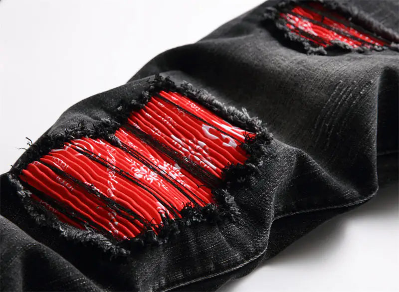 Modische neue Bikerjeans