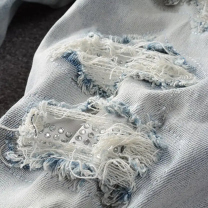 Vaqueros desgastados celestes